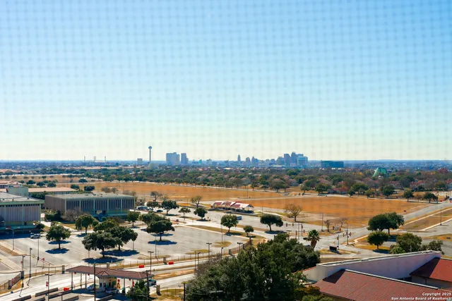 a view of a city and lake