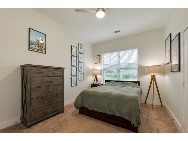 a kitchen with a cabinets and wooden floor