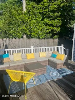 swimming pool view with a outdoor seating