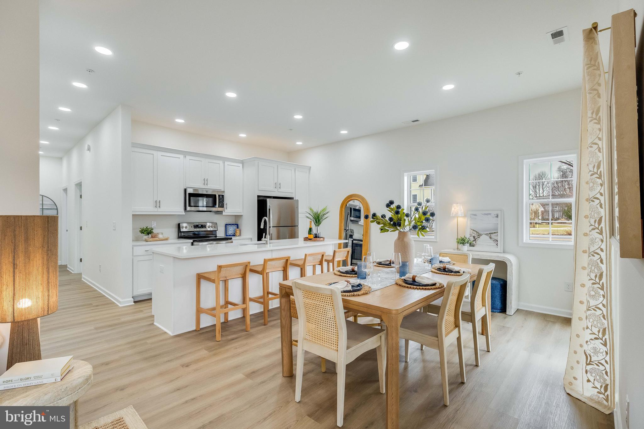a view of kitchen with cabinets and wooden floor