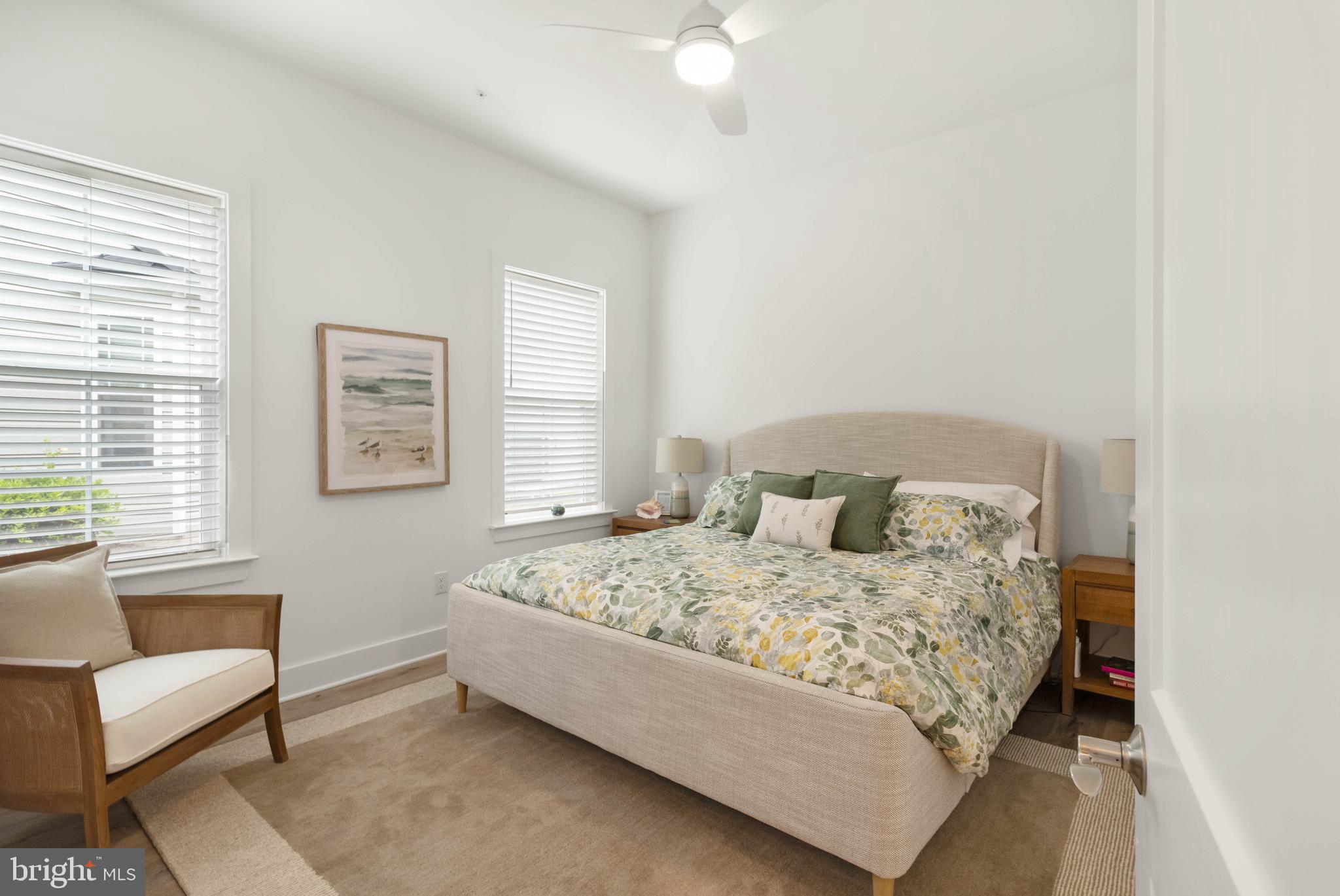 2 Bowers Drive, Unit 103 Ocean View, DE 19970 - Photo 13 of 52 a bedroom with a bed and a couch