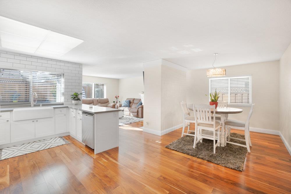 1408 Eagles Nest Lane Gilroy, CA 95020 - Photo 11 of 43 a kitchen with a sink cabinets and wooden floor