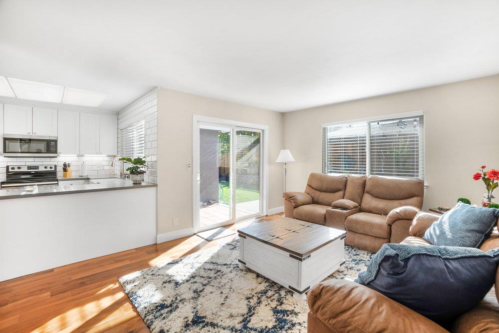 1408 Eagles Nest Lane Gilroy, CA 95020 - Photo 16 of 43 a living room with furniture and a open kitchen view