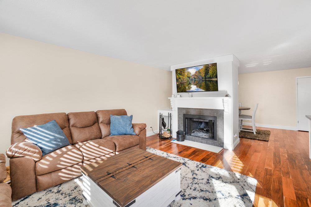 1408 Eagles Nest Lane Gilroy, CA 95020 - Photo 18 of 43 a living room with furniture and a fireplace