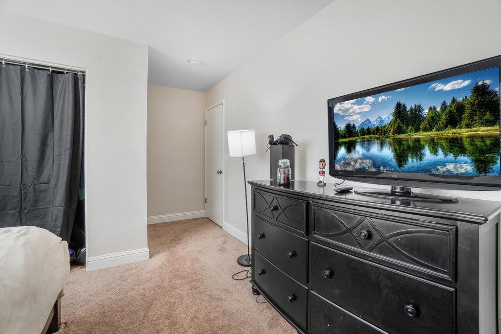 1408 Eagles Nest Lane Gilroy, CA 95020 - Photo 28 of 43 a kitchen with stainless steel appliances a sink and a microwave