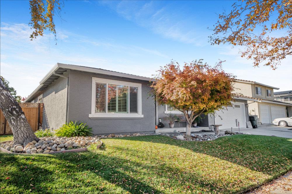 1408 Eagles Nest Lane Gilroy, CA 95020 - Photo 3 of 43 a front view of a house with garden