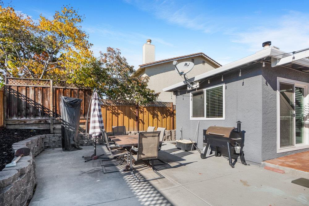 1408 Eagles Nest Lane Gilroy, CA 95020 - Photo 37 of 43 a row of palm trees in front of a house