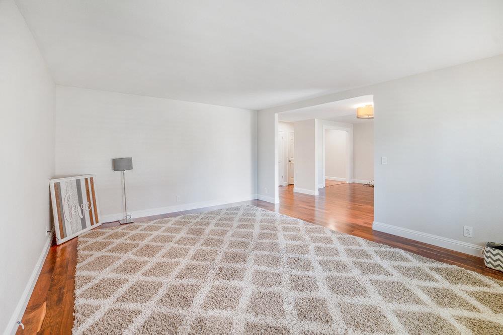 1408 Eagles Nest Lane Gilroy, CA 95020 - Photo 7 of 43 a bedroom with a bed and a lamp on the table