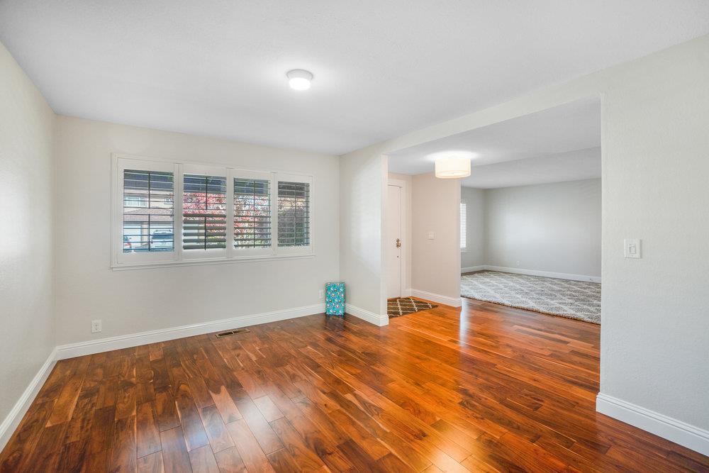 1408 Eagles Nest Lane Gilroy, CA 95020 - Photo 10 of 43 a view of empty room with wooden floor and fan