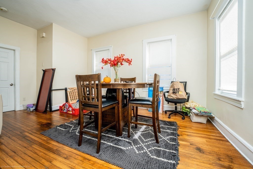 772 Globe Street Fall River, MA 02724 - Photo 11 of 23 a view of a dining room with furniture and wooden floor