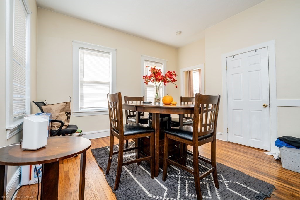 772 Globe Street Fall River, MA 02724 - Photo 12 of 23 a dining room with furniture and wooden floor