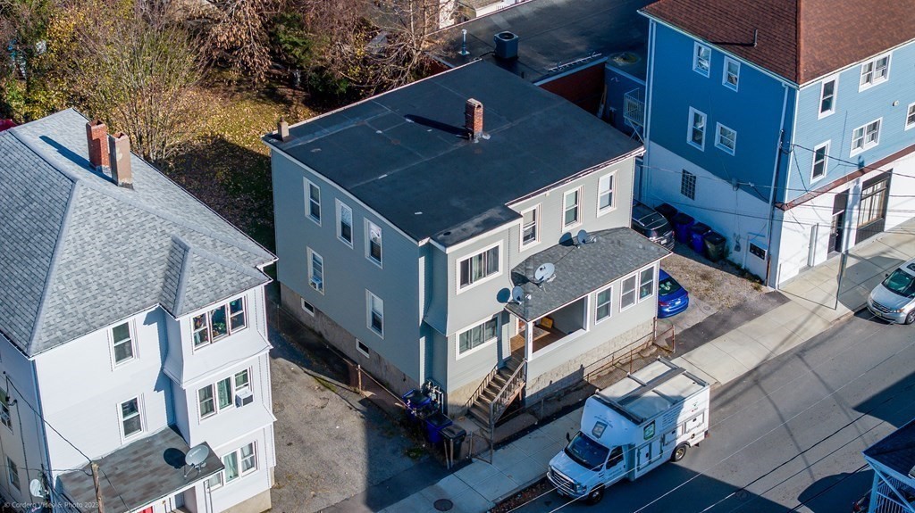 772 Globe Street Fall River, MA 02724 - Photo 2 of 23 a aerial view of a house with a yard