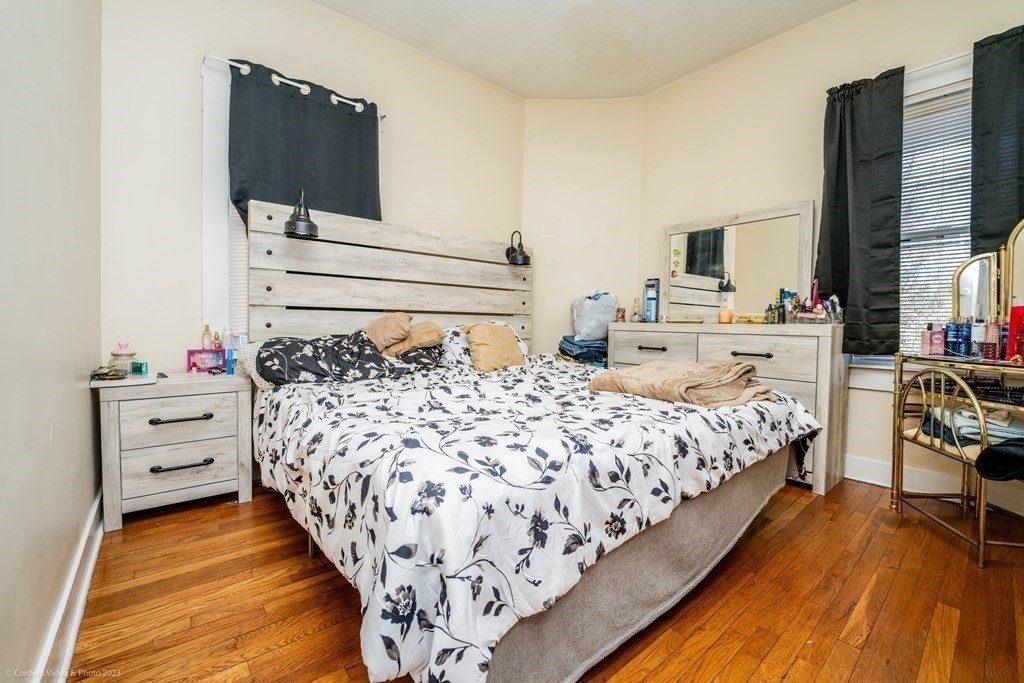 772 Globe Street Fall River, MA 02724 - Photo 21 of 23 a bed room with a bed and flat screen tv