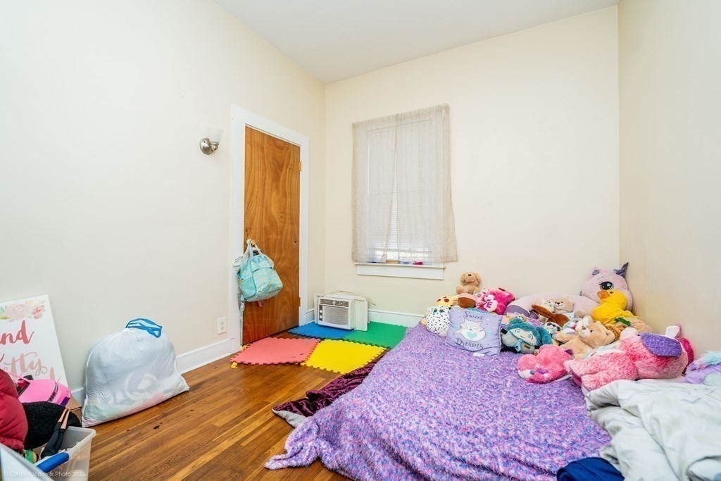 772 Globe Street Fall River, MA 02724 - Photo 22 of 23 a bedroom with a bed and a window