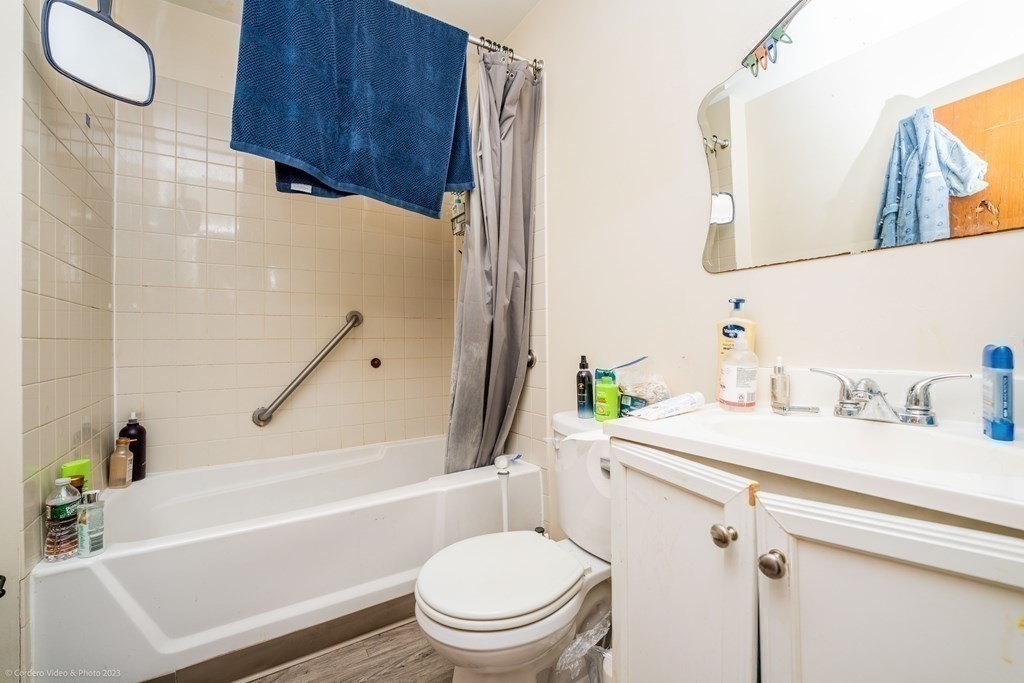 772 Globe Street Fall River, MA 02724 - Photo 23 of 23 a bathroom with a sink a toilet and a bathtub