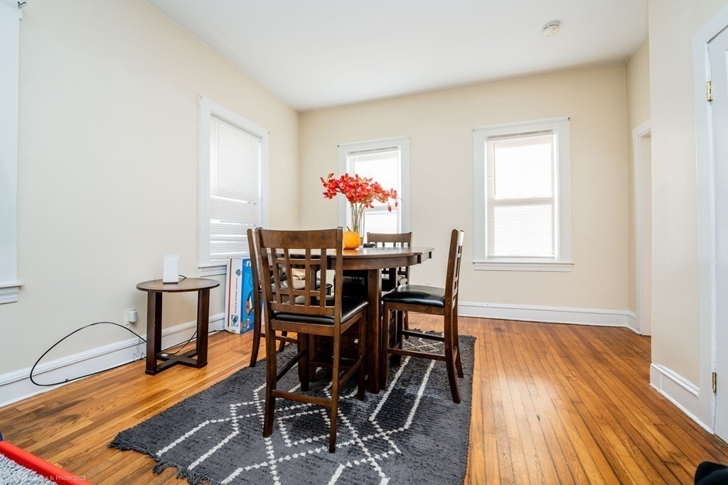 772 Globe Street Fall River, MA 02724 - Photo 10 of 23 a dining room with furniture and wooden floor