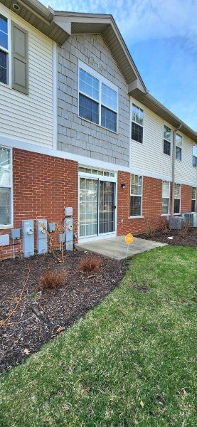 24113 Walnut Circle Plainfield, IL 60585 - Photo 21 of 21 a front view of a house with garden