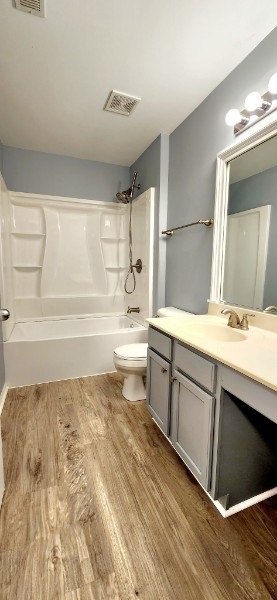 24113 Walnut Circle Plainfield, IL 60585 - Photo 9 of 21 a bathroom with a sink vanity granite tub and toilet