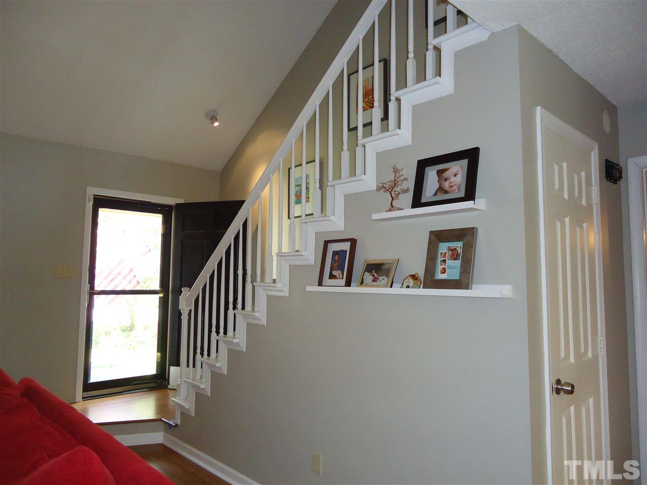 3616 Wickersham Way Raleigh, NC 27604 - Photo 14 of 23 a view of entryway and hall with wooden floor