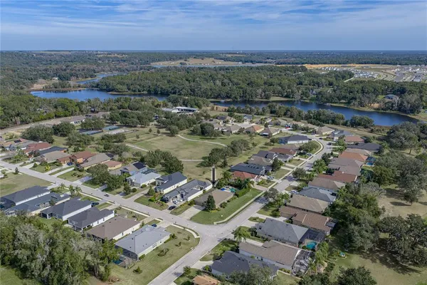 an aerial view of residential building and green space