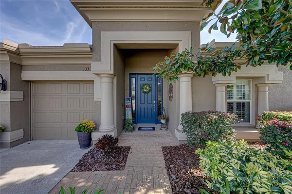 a large kitchen with kitchen island a large island in the center