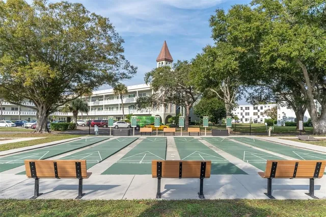a park bench sitting in the middle of a park