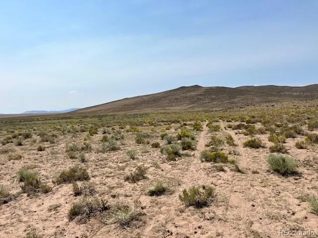 a view of a lake with a mountain