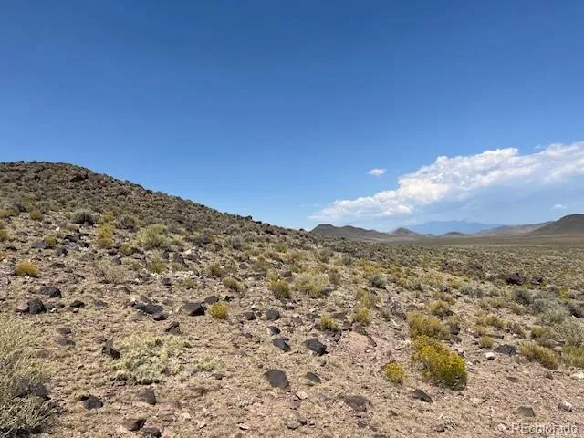 a view of beach and mountain