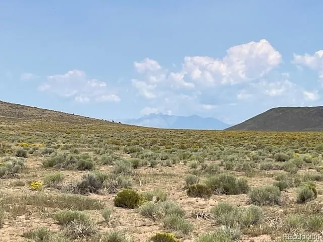 a view of lake and mountain