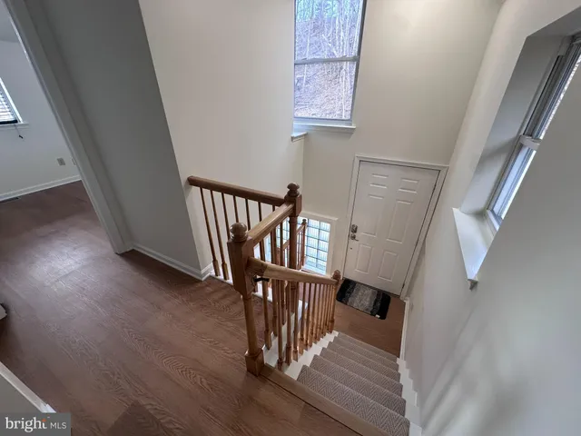a view of entryway with wooden floor