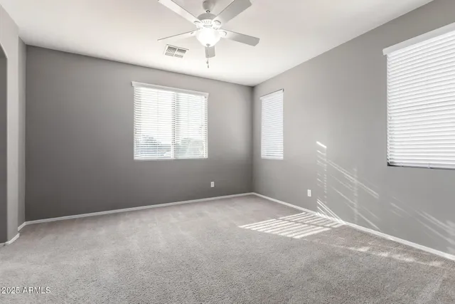 a bathroom with a bathtub and shower curtain