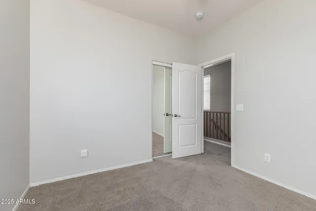 a bathroom with a sink a mirror and a toilet