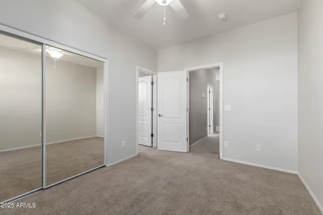 a view of backyard with door and porch