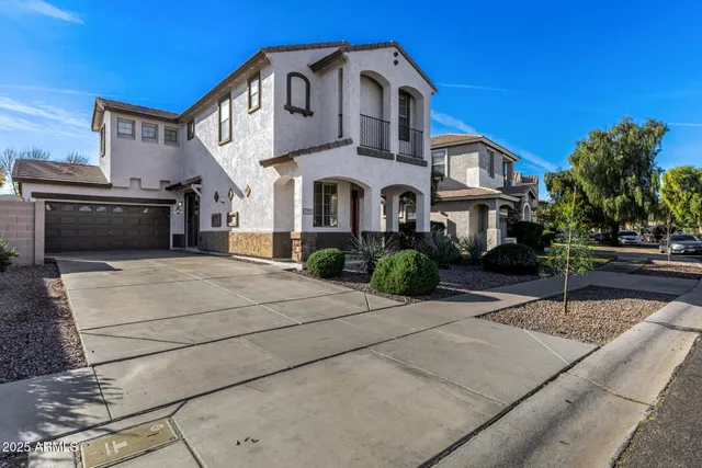 a kitchen with stainless steel appliances granite countertop wooden cabinets a stove top oven a sink and dishwasher