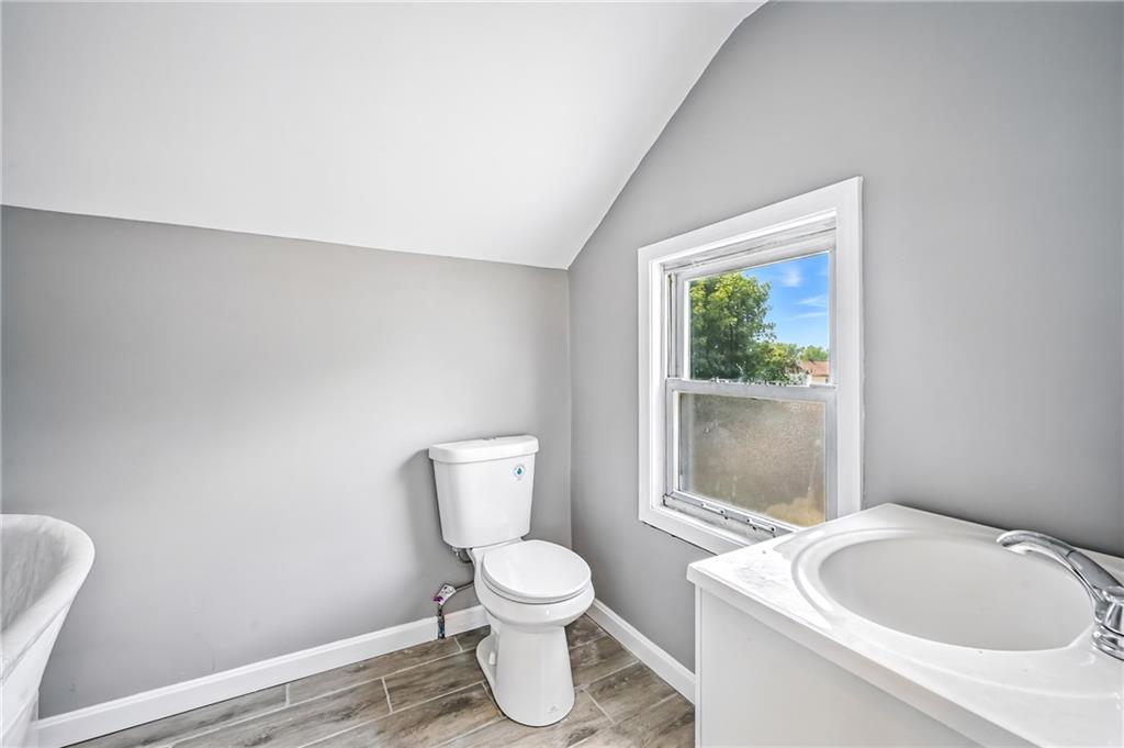 674 Deforest Court Sharon, PA 16146 - Photo 31 of 45 a white toilet sitting next to a bathroom sink