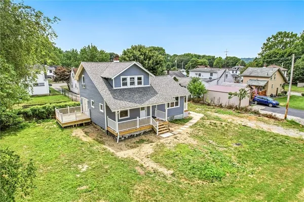 a view of a porch with a bench