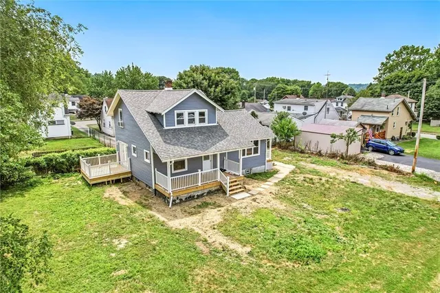 a view of a porch with a bench