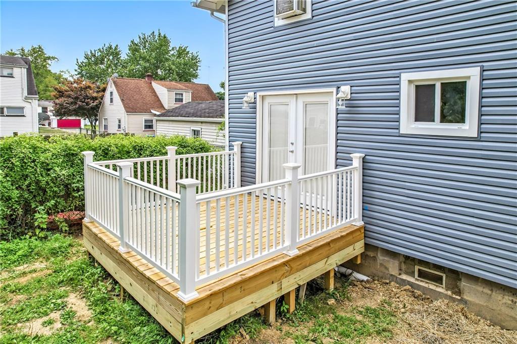 674 Deforest Court Sharon, PA 16146 - Photo 36 of 45 a view of a porch with a bench