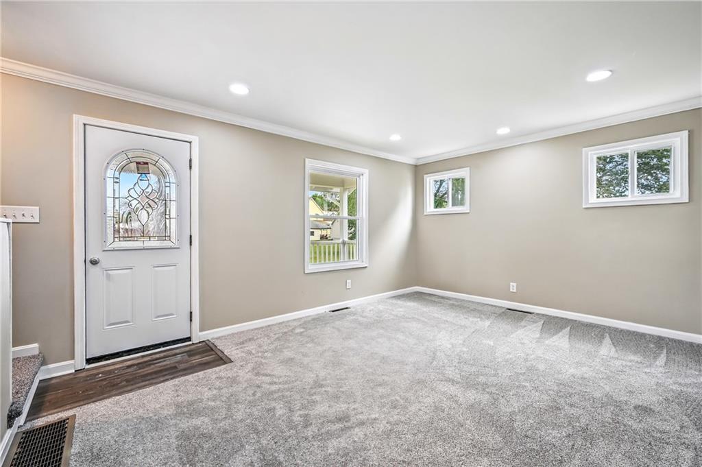 674 Deforest Court Sharon, PA 16146 - Photo 7 of 45 a view of a big room with window and cabinet