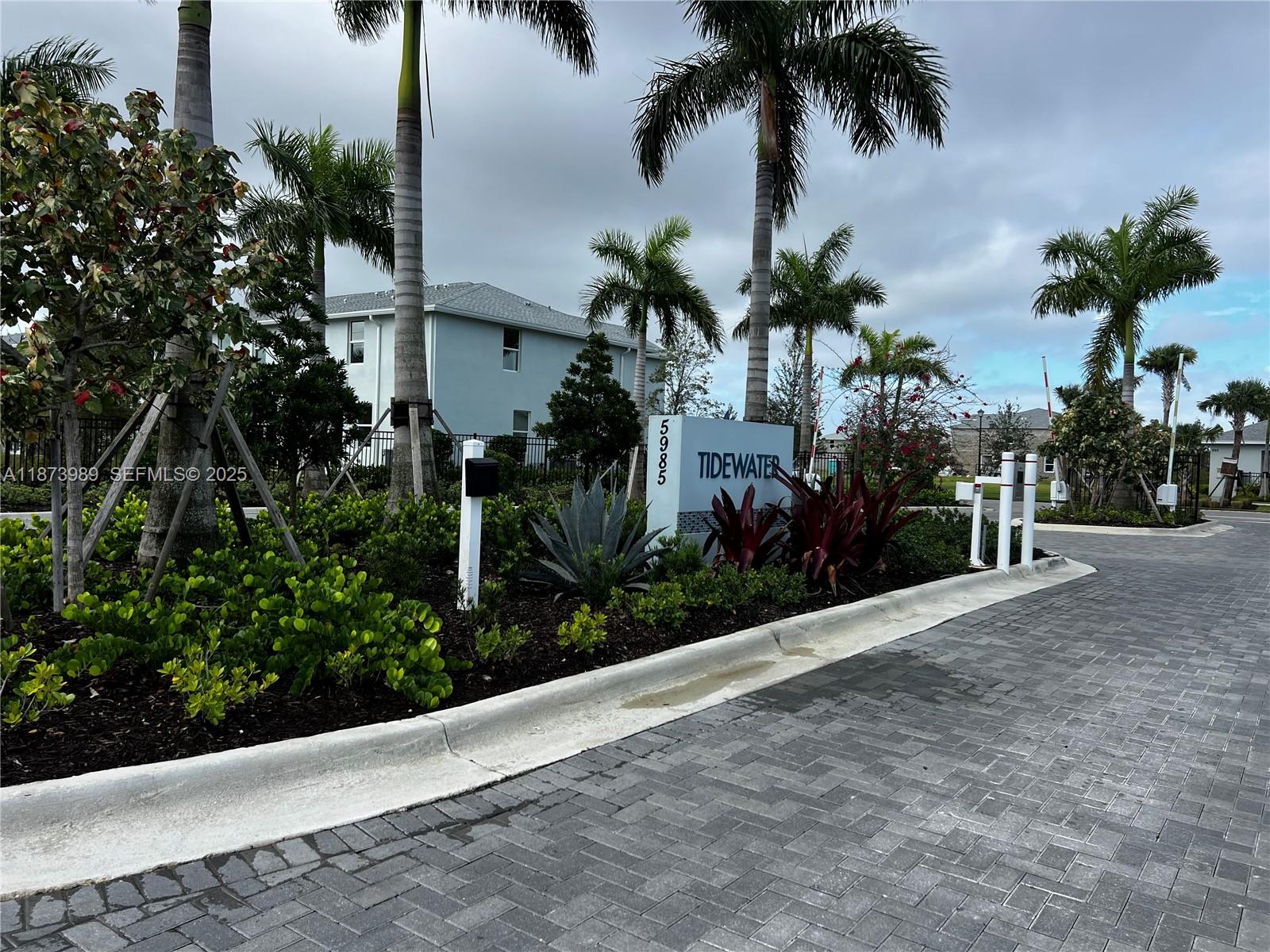 478 Salisbury Circle Fort Pierce, FL 34982 - Photo 2 of 11 a view of a garden with palm trees