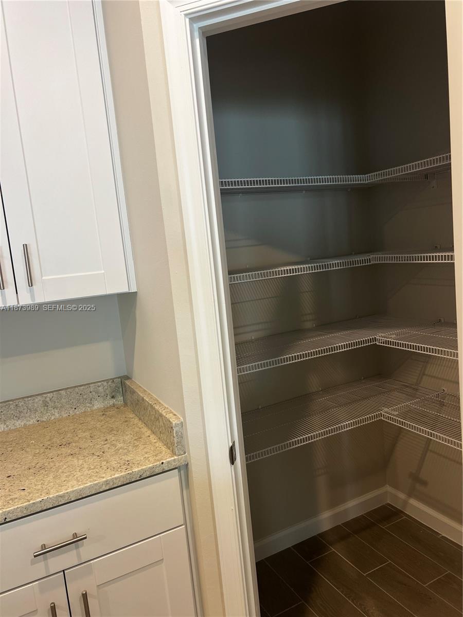 478 Salisbury Circle Fort Pierce, FL 34982 - Photo 6 of 11 a view of a walk in closet