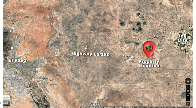 a sign that is sitting on a brick wall