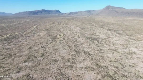 a view of mountains and valleys