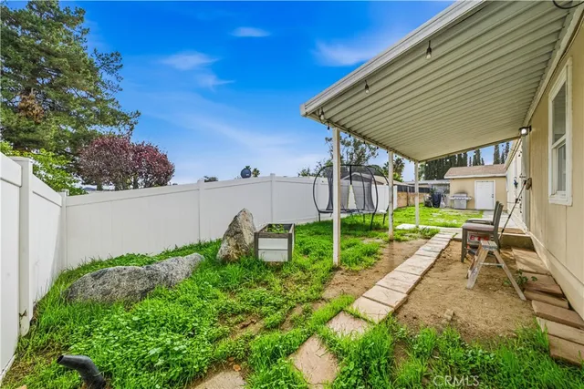 a view of a backyard with plants