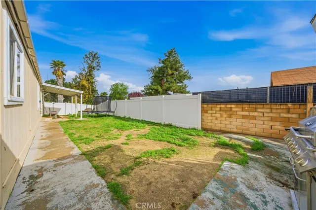 a view of a backyard with a garden