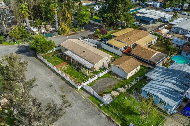 an aerial view of residential house with outdoor space