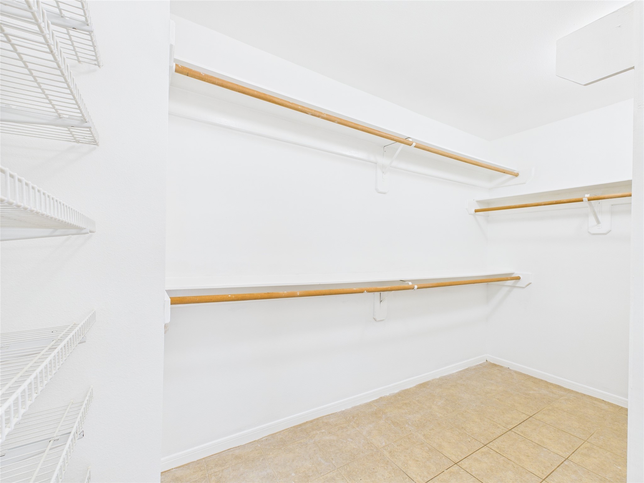 7107 Seminole Street Baytown, TX 77521 - Photo 28 of 33 Primary Bedroom Closet