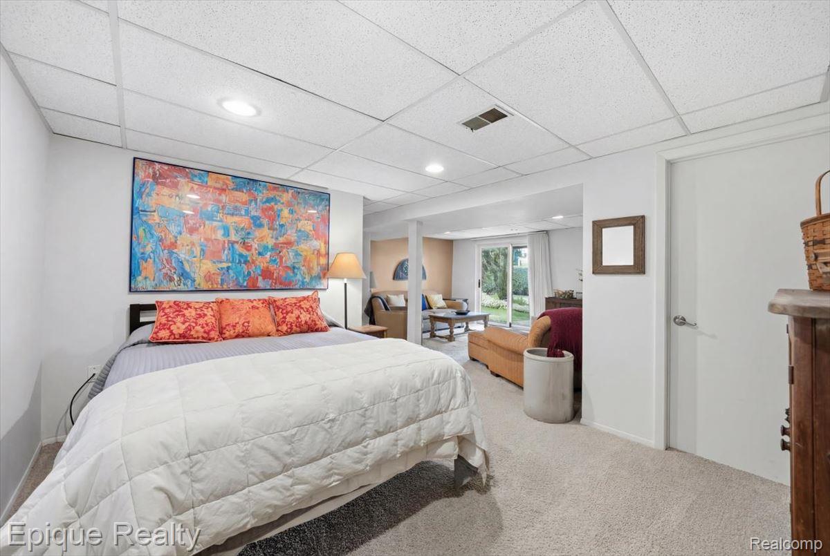 26 Kirks Court Rochester, MI 48309 - Photo 28 of 44 Carpeted room featuring recessed lighting and a drop ceiling