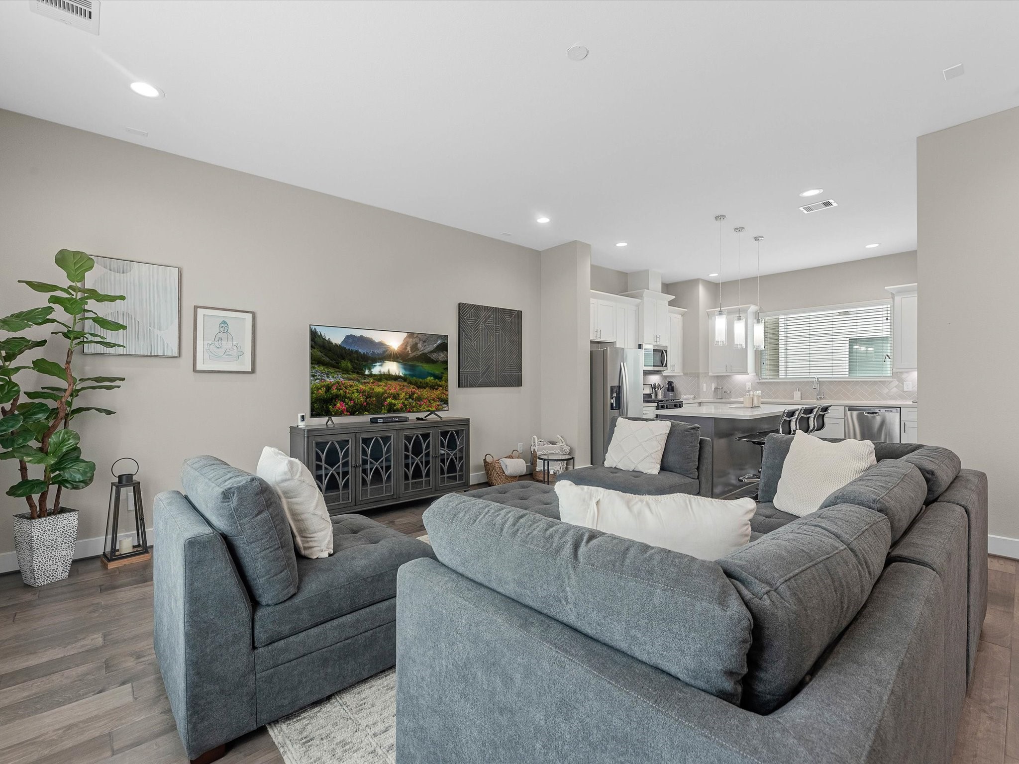 8311 Brecha Lane Houston, TX 77055 - Photo 4 of 19 a living room with furniture and a flat screen tv