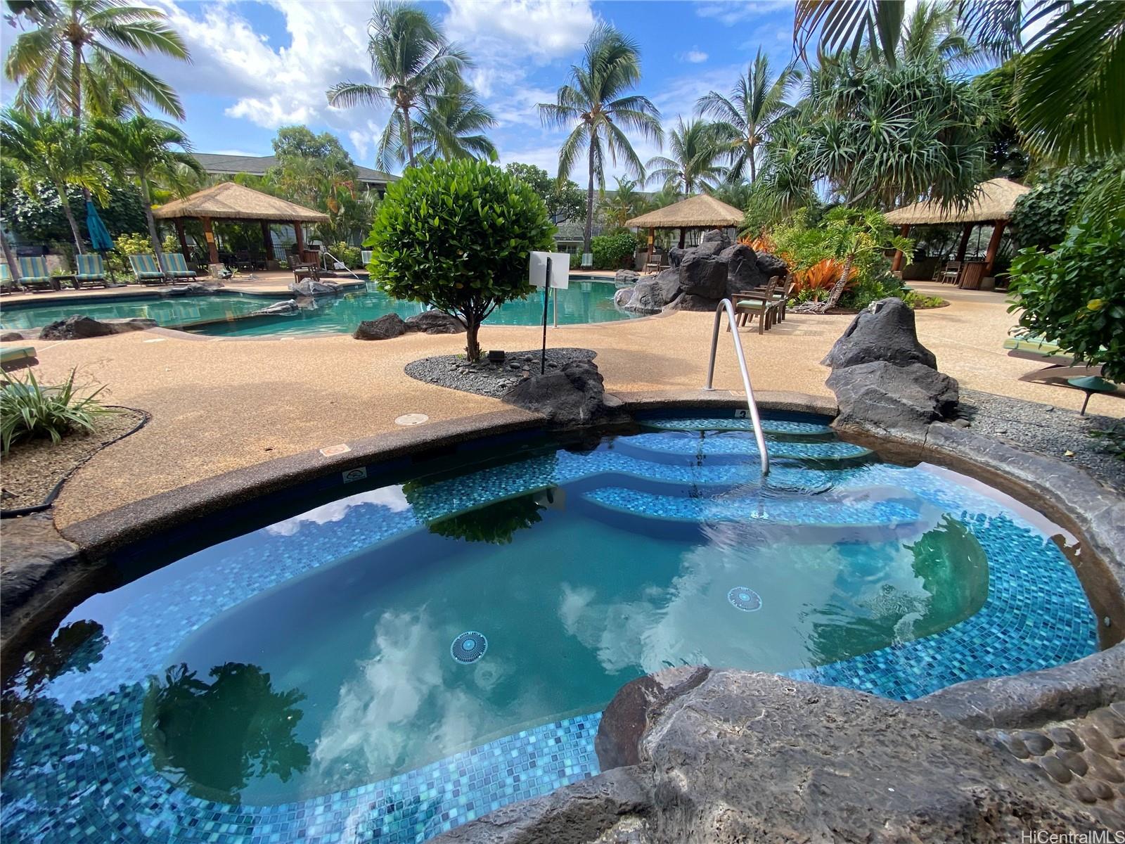 92-1037 Koio Drive, Unit M11 Kapolei, HI 96707 - Photo 11 of 11 swimming pool view with a seating space